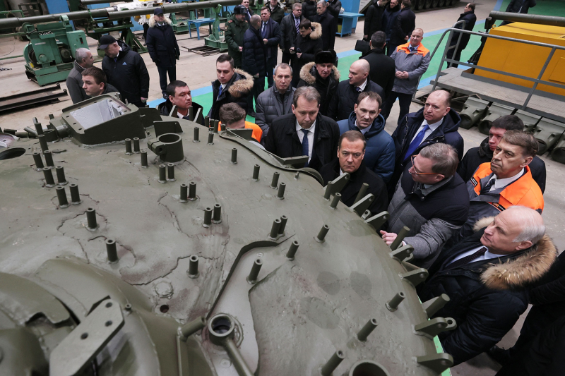 Dmitry Medvedev (center in the group of officials), an ally of Russian President Vladimir Putin who is now deputy chairman of the country's security council, visits the Omsktransmash (Omsk transport machine factory) in the southern Siberian city of Omsk.