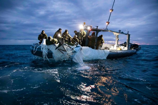 sailors assigned to Explosive Ordnance Disposal Group 2 recovering a high-altitude surveillance balloon off the coast of Myrtle Beach, S.C