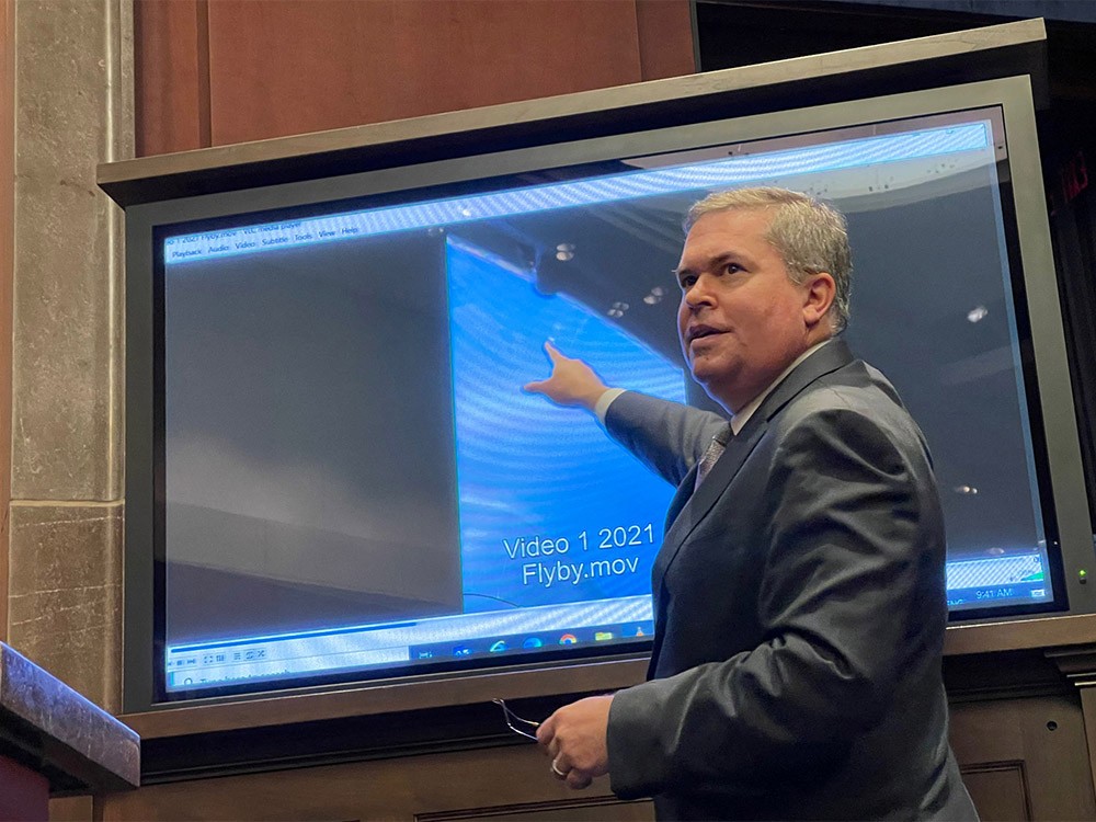 FILE PHOTO: Deputy Director of U.S. Naval Intelligence Scott Bray points to a video of a 'flyby' as he testifies before a House Intelligence Counterterrorism, Counterintelligence, and Counterproliferation Subcommittee hearing about "Unidentified Aerial Phenomena," in the first open congressional hearing on 'UFOs' in more than half-century, on Capitol Hill in Washington, U.S., May 17, 2022.