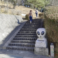 A statue resembling an alien in the Iinomachi district of Fukushima | KYODO