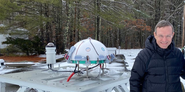 Harvard Professor Avi Loeb, of the Galileo Project, stands with the infrared and optical cameras of the Galileo Project Observatory