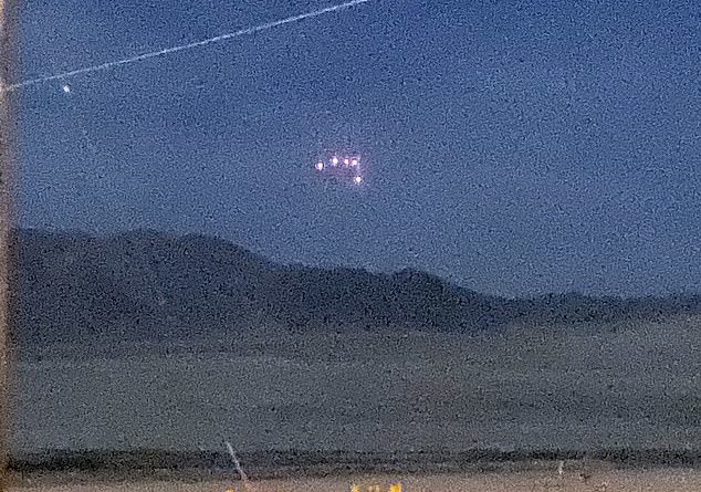 Triangular UFO hovers over California military base in new footage