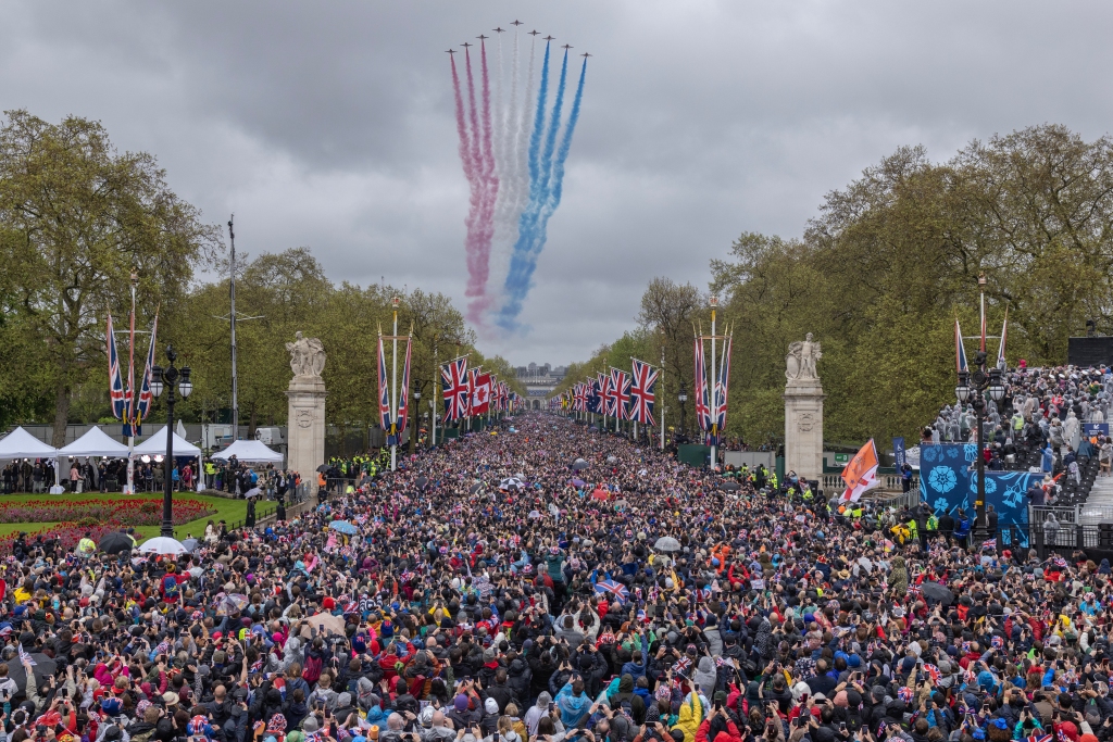 A photographer claims to have seen a UFO in a flyby formation for the coronation of King Charles III.