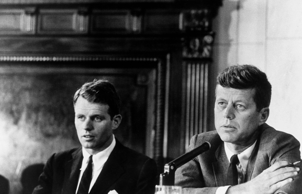 RFK Jr. holds views that many might characterize as "conspiratorial" — including the belief that the CIA was behind the death of his uncle, JFK (on the right with RFK in 1957).