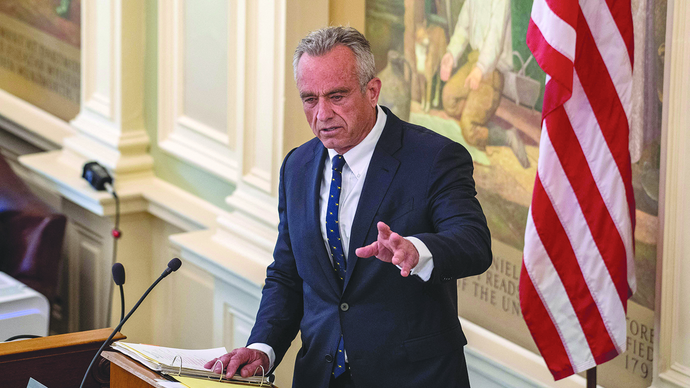 Robert Kennedy, Jr. gestures as he speaks at a podium