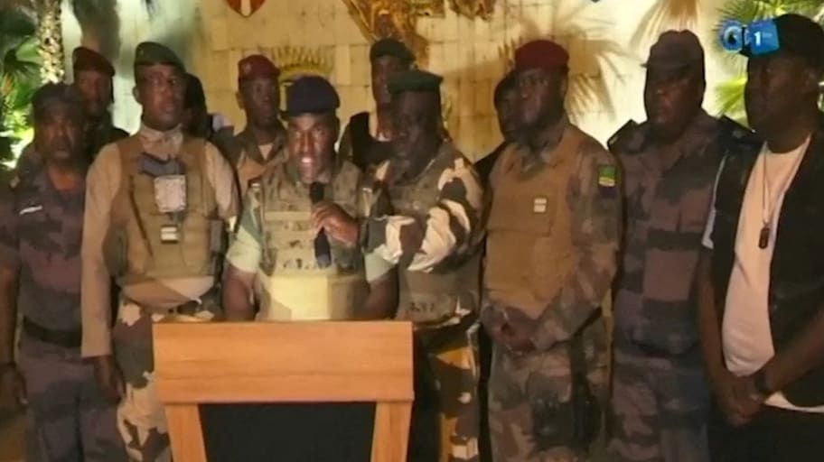 Gabonese military appear on television as they announce that they have seized power following President Ali Bongo Ondimba's re-election, in this screengrab obtained by Reuters on August 30, 2023. 