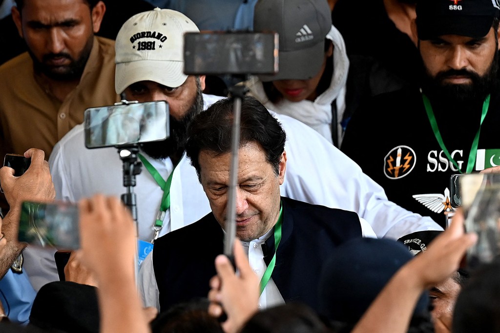 Pakistan's former Prime Minister Imran Khan (C) leaves after appearing in the Supreme Court in Islamabad on July 26, 2023. (Photo by Aamir QURESHI / AFP) (Photo by AAMIR QURESHI/AFP via Getty Images)