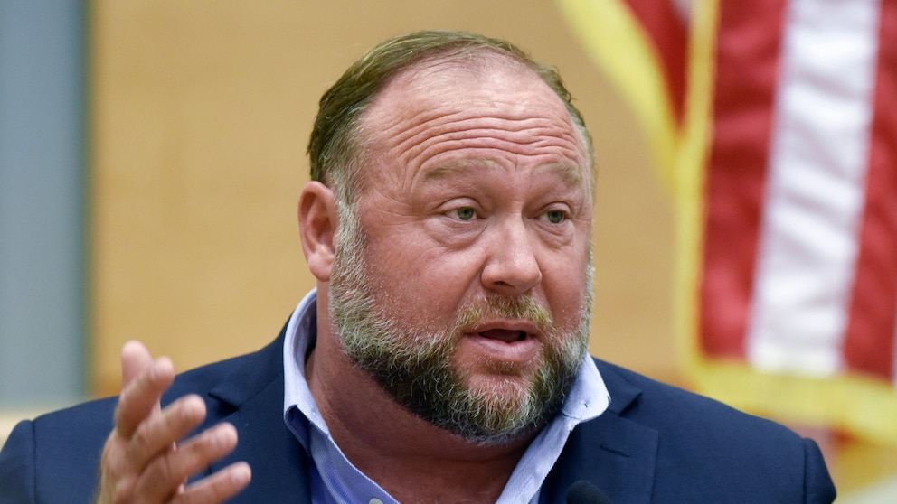 FILE - Conspiracy theorist Alex Jones takes the witness stand to testify at the Sandy Hook defamation damages trial at Connecticut Superior Court in Waterbury, Conn. Thursday, Sept. 22, 2022. A Texas judge has ruled that Jones cannot use bankruptcy protection to avoid paying nearly $1 billion to families who sued over his conspiracy theories that the Sandy Hook school massacre was a hoax. (Tyler Sizemore/Hearst Connecticut Media via AP, Pool, File)