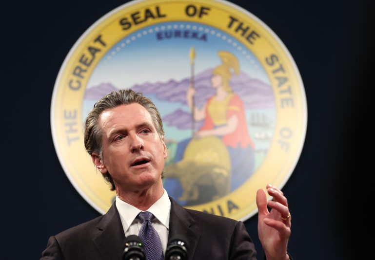 SACRAMENTO, CALIFORNIA - FEBRUARY 01: California Gov. Gavin Newsom speaks during a press conference on February 01, 2023 in Sacramento, California. California Gov. Gavin Newsom, state Attorney General Rob Bonta, state Senator Anthony Portantino (D-Burbank) and other state leaders announced SB2 - a new gun safety legislation that would establish stricter standards for Concealed Carry Weapon (CCW) permits to carry a firearm in public. The bill designates "sensitive areas," like bars, amusement parks and child daycare centers where guns would not be allowed. (Photo by Justin Sullivan/Getty Images)