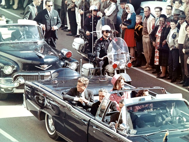 President John F. Kennedy in the limousine in Dallas, minutes before he was assassinated. The car is on display at the Henry Ford museum in Dearborn. - Walt Cisco, Dallas Morning News, public domain