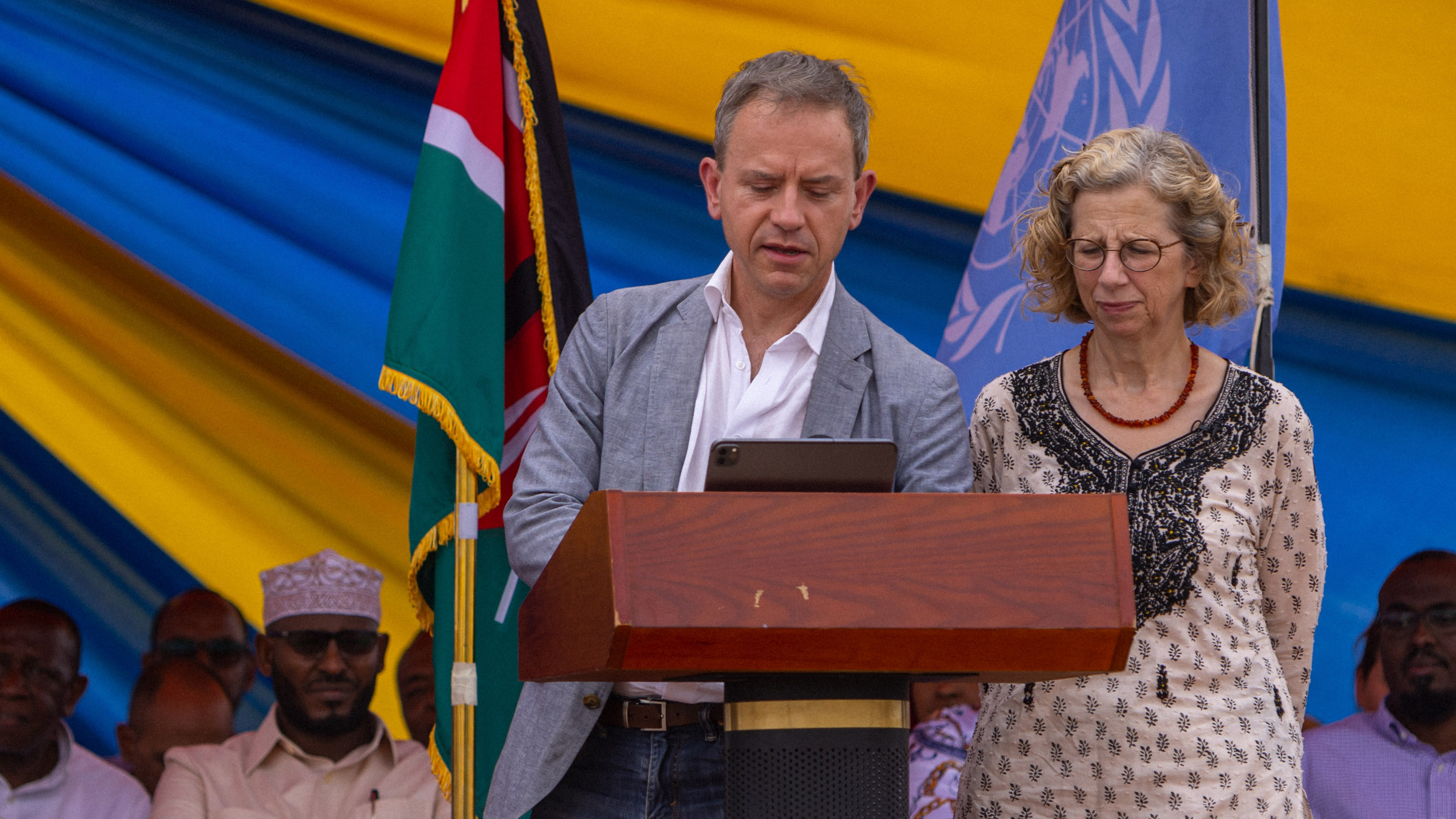 Stephen and UNEP Executive Director Inger Andersen speaking at a podium.