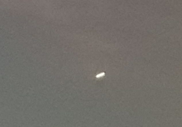 Bird, plane... or UFO? Woman spots illuminous 'Tic-Tac' shaped object