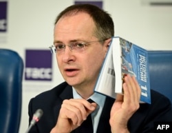 Kremlin aide Vladimir Medinsky attends a press conference to present a new schoolbook for high school students on general world history and Russian history in Moscow on August 7, 2023. (Yuri Kadobnov/AFP)