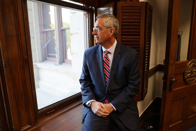 FILE - Georgia Secretary of State Brad Raffensperger in his state capitol office in August, shortly before indictments over the state’s 2020 elections. Raffensperger is asking for investigations into more than a dozen cases of possible voter fraud related to the 2022 General Election.