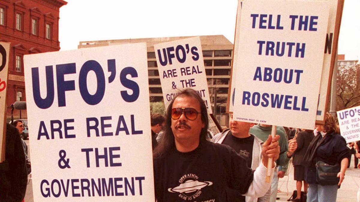 UFO Protestor with sign