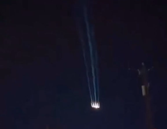 UFO footage leaves onlookers baffled as flaming orbs seen diving through sky