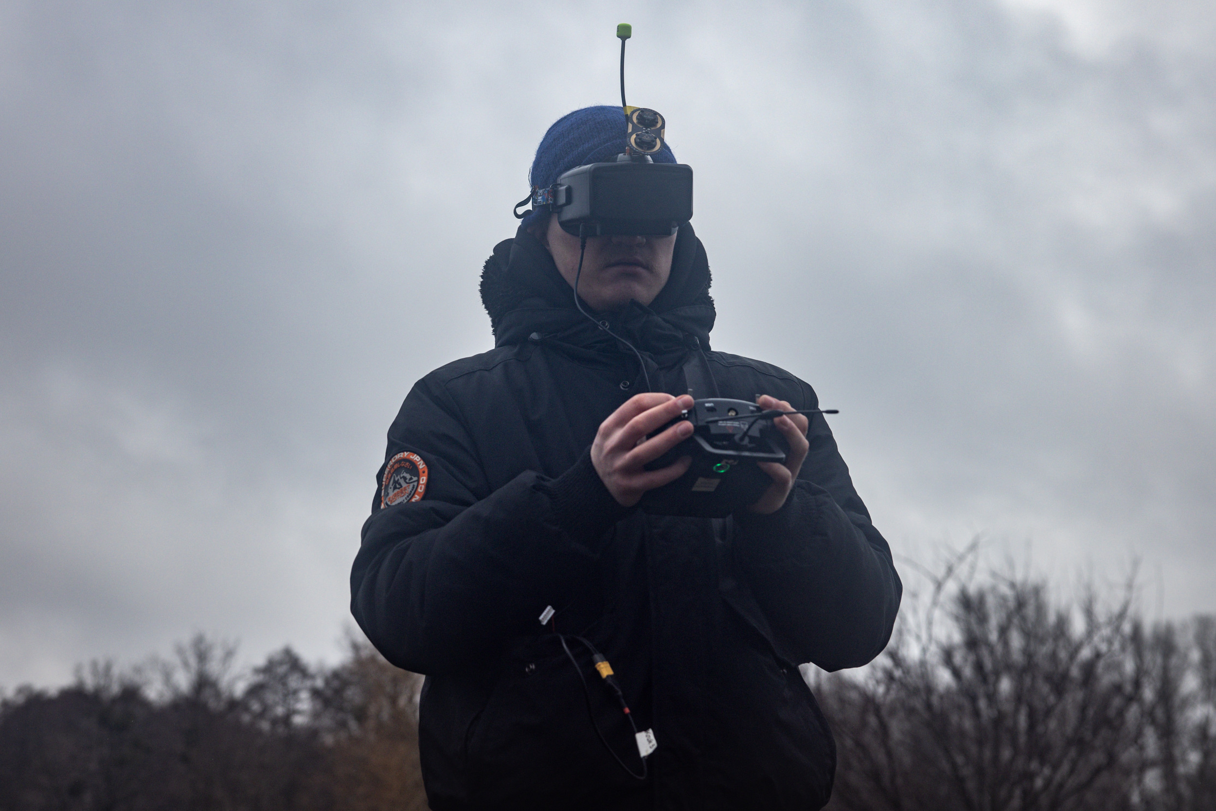 A civilian trains with an FPV drone