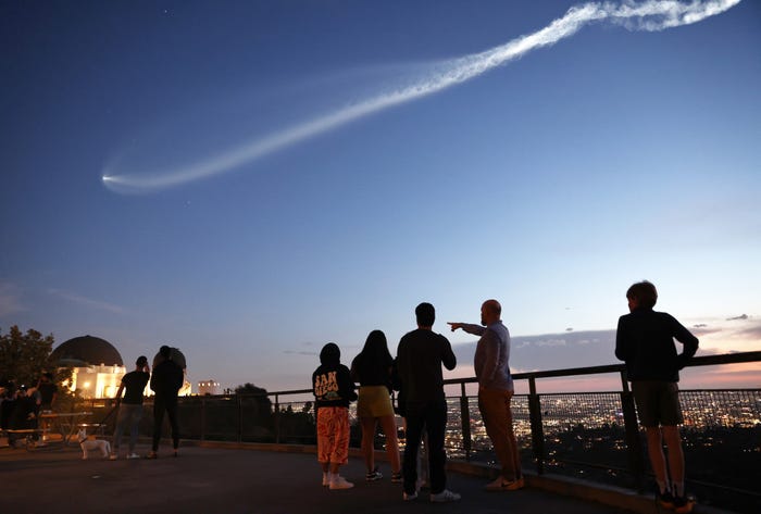 Observers at the Griffith National Park observatory point to a blob streaking the sky above Los Angeles.