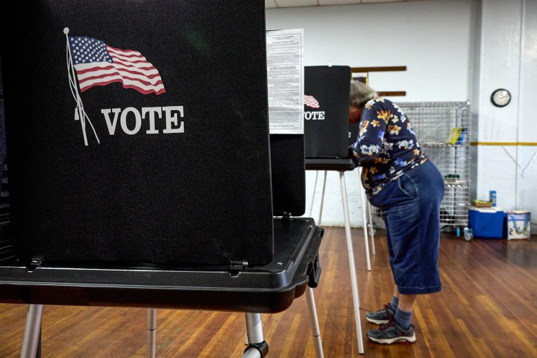 A voter fills out their ballot at a polling station at the American Legion in Shasta Lake during a special election in Shasta County Nov. 7, 2023. Photo by Fred Greaves for CalMatters