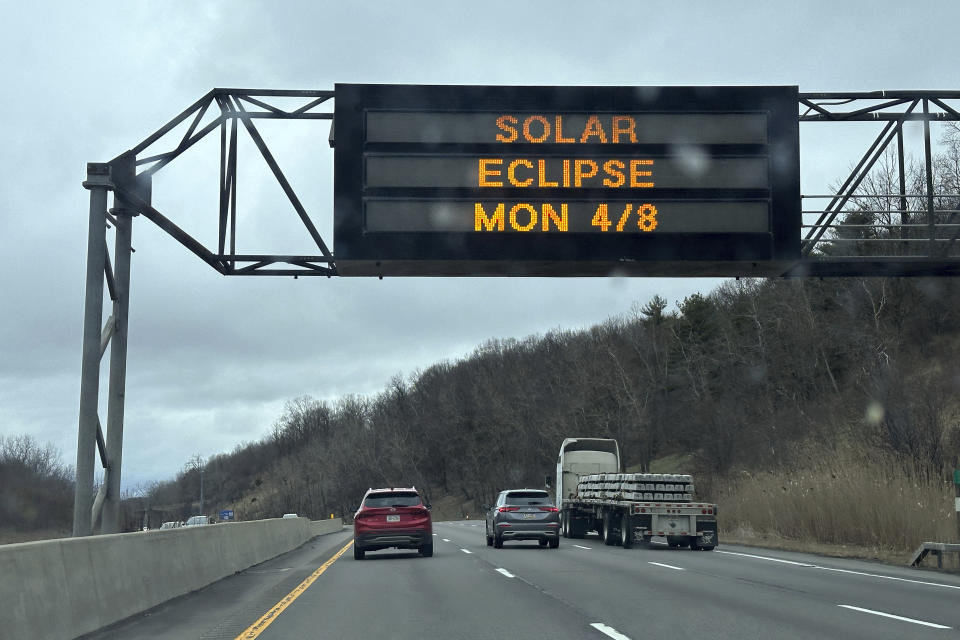 A sign on I-81 in New York highlights the solar eclipse happening 
