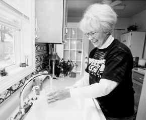 Mary Hendershott would like to keep the water she gets from the tap in her Connersville home unflouridated. Hendershott is leading the fight against an effort to add flouride to to the city's water supply. The issue will be on Tuesday's ballot. AP photo