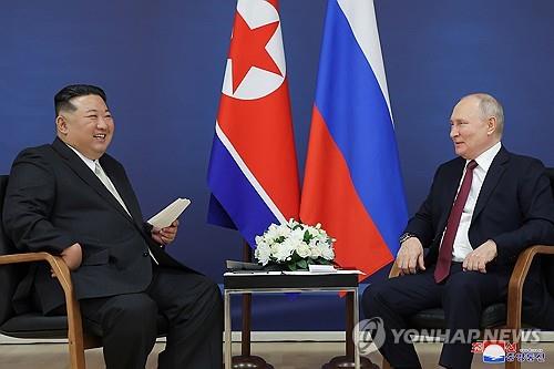 This file photo, carried by the North's official Korean Central News Agency on Sept. 14, 2023, shows its leader Kim Jong-un (L) and Russian President Vladimir Putin holding a summit at Russia's Vostochny spaceport the previous day. (For Use Only in the Republic of Korea. No Redistribution) (Yonhap)