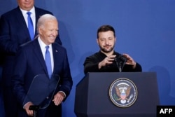 Ukraine's President Volodymyr Zelenskyy speaks alongside U.S. President Joe Biden during a Ukraine Compact initiative on the sidelines of the NATO Summit at the Walter E. Washington Convention Center in Washington, D.C., on July 11, 2024. (Ludovic Marin/AFP)