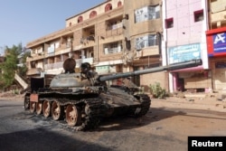 A damaged army tank is seen on the street, almost one year into the war between the Sudanese Armed Forces and the paramilitary Rapid Support Forces (RSF), in Omdurman, Sudan. (El Tayeb Siddig/REUTERS)