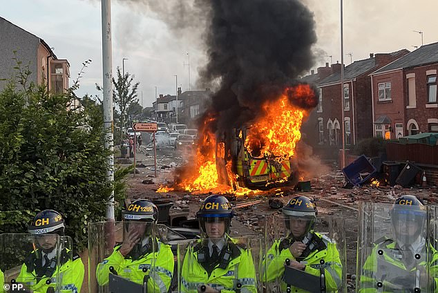 A police van was set on fire near a mosque in Southport on Tuesday evening as riots broke out