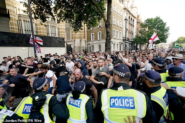 Violence erupted on the streets of London on Wednesday as flag-waving protesters clash with police