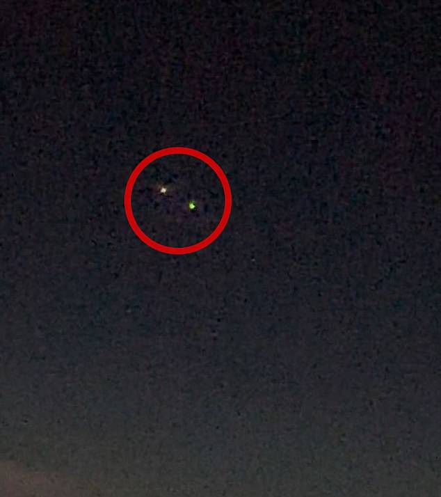 An airline pilot claims he spotted two UFOs hovering near each other (pictured), 35,000 feet over the Atlantic Ocean on August 19