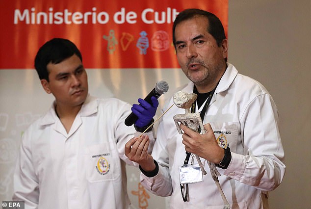 But Dr Flavio Estrada (right), a forensic archaeologist with Peru's Institute of Legal Medicine and Forensic Sciences in Lima has said that the alien bodies are nothing more than grisly dolls, 'assembled with bones of animals from this planet, with modern synthetic glues'