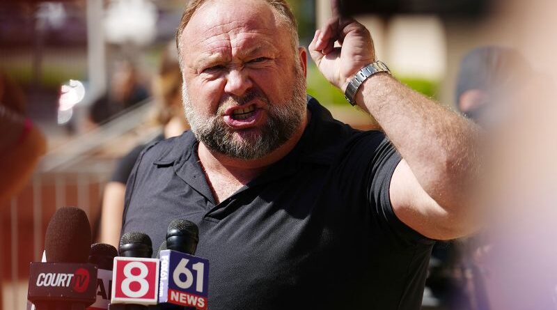 Alex Jones’ conspiracy theory empire Infowars will be sold for parts to help pay Sandy Hook families | CNN Business