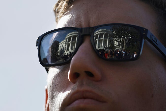 A Secret Service employee in front of the White House in Washington.