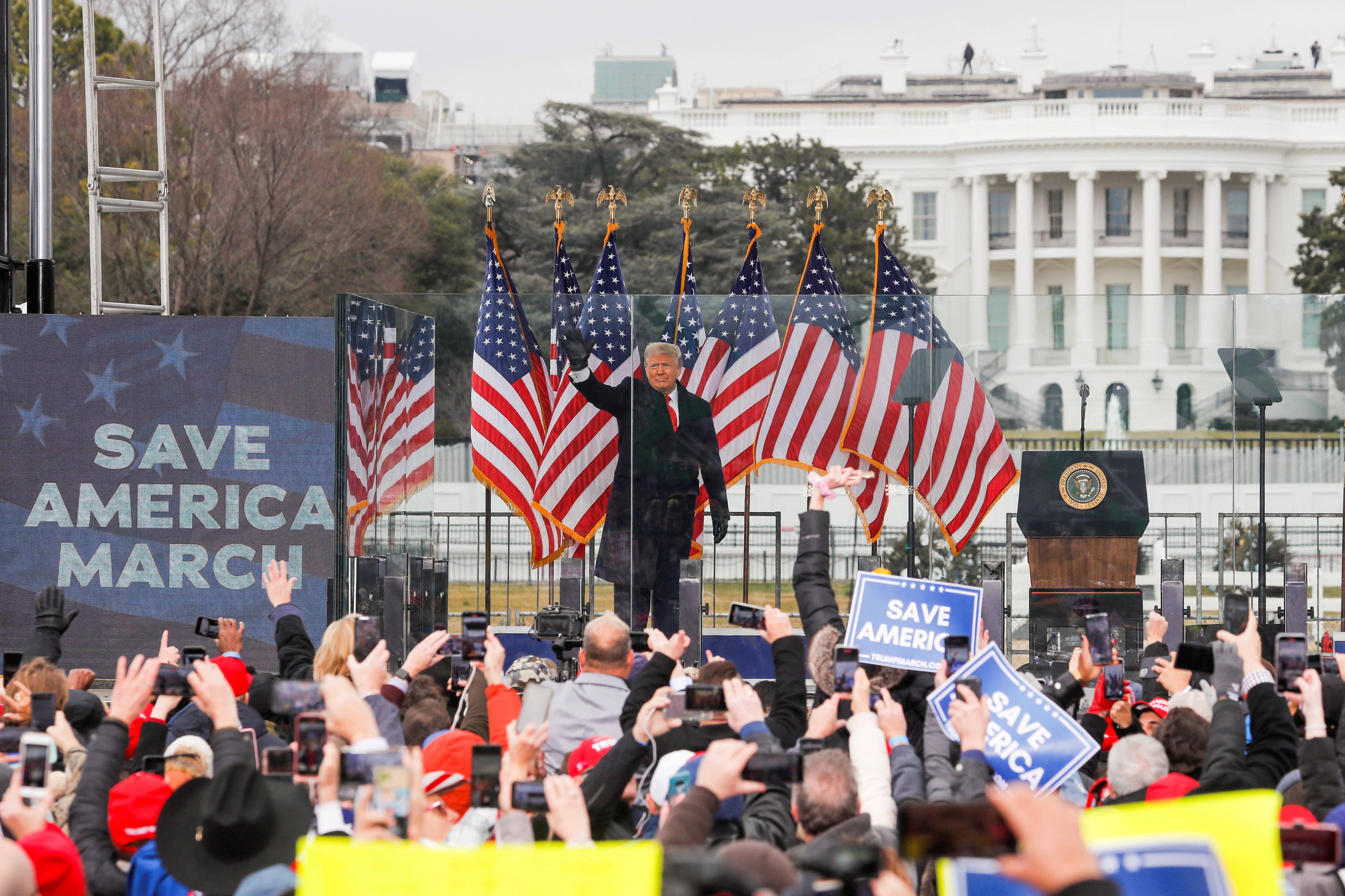 Then-President Trump waves to supporters during a rally to contest the certification of the 2020 U.S. presidential election results by Congress, in Washington, DC, January 6, 2021.