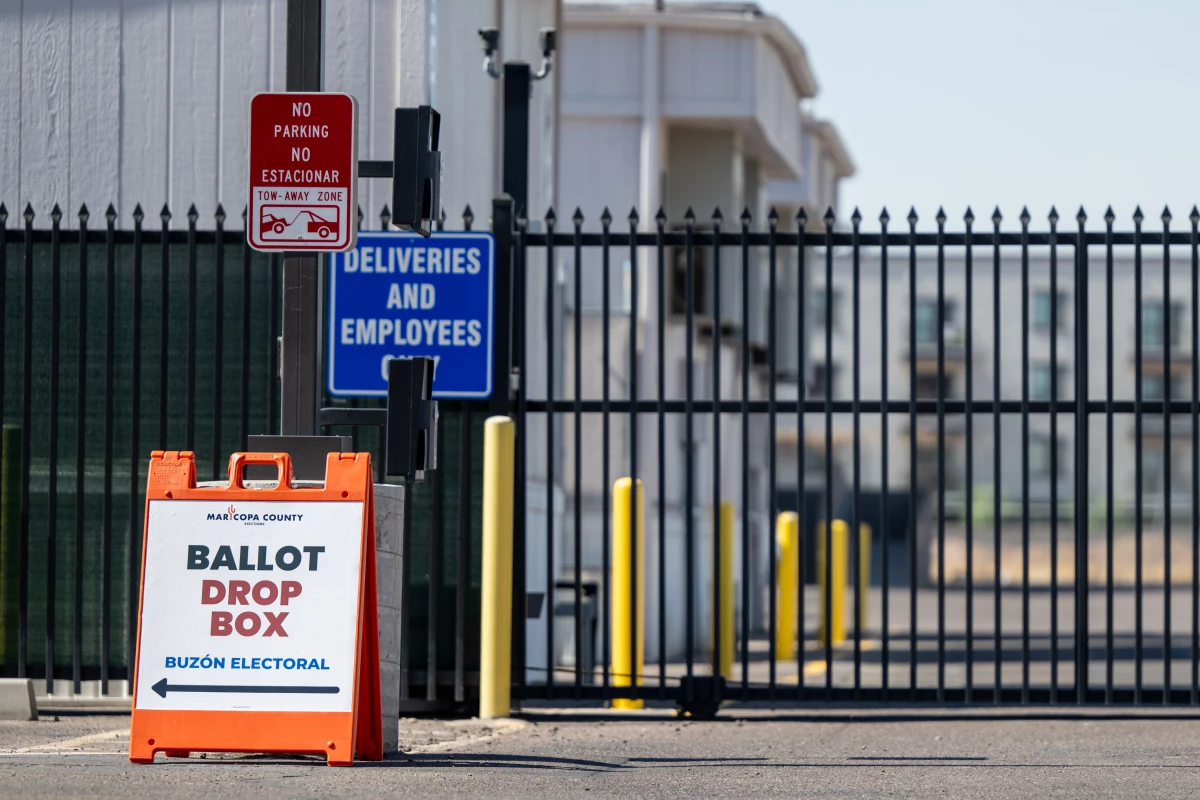 Ballot drop off instructions are displayed near the entrance of the Maricopa County Elections Department on Oct. 11, 2024 in Phoenix, Arizona. Early voting is underway in the state of Arizona ahead of the Nov. 5th elections.