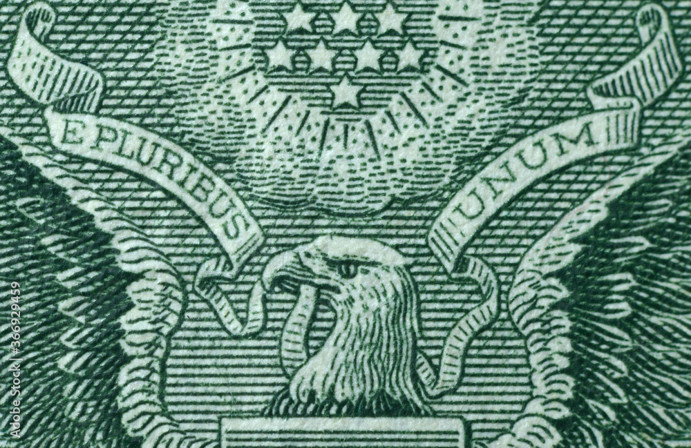 Picture of part of Great Seal of the United States with writing E Pluribus Unum, Out of many one, printed on One USA dollar banknote Stock Photo | Adobe Stock