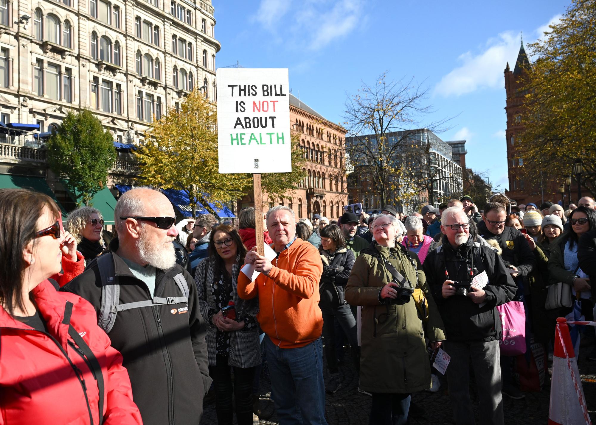 Protestors pictured at Belfast City Hall against the NI Public Health Bill.