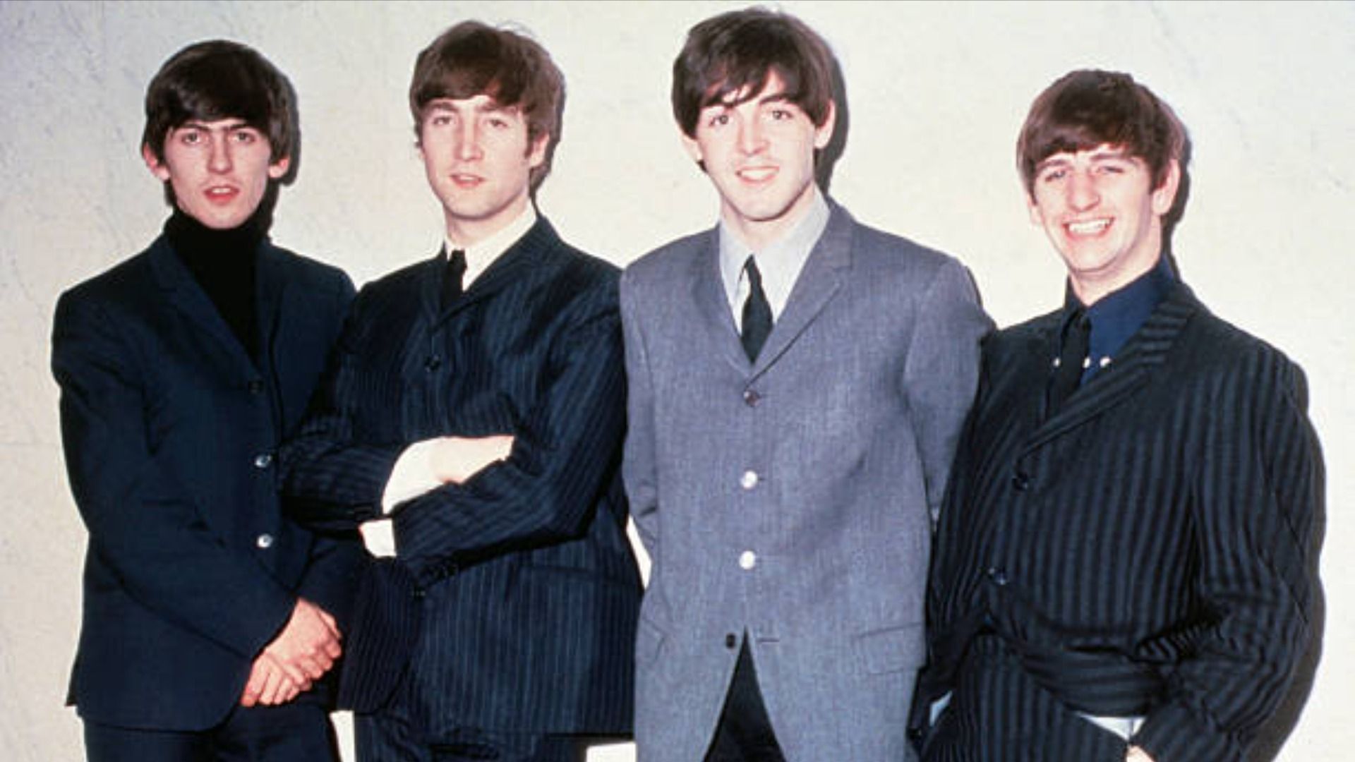 The Beatles posing together. / Image Source: Getty