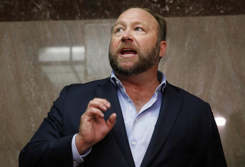 Jones alleges a conspiracy led to the sale of Infowars (REUTERS)