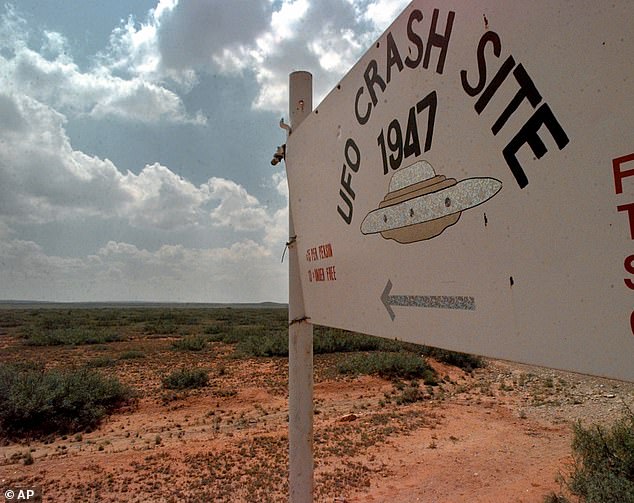 Roswell was dubbed the 'UFO capital of the world' following an alleged spaceship crash in 1947 known as the 'Roswell Incident'. Above, a sign directing Roswell, New Mexico visitors to the start of a '1947 UFO Crash Site Tour' circa 1997