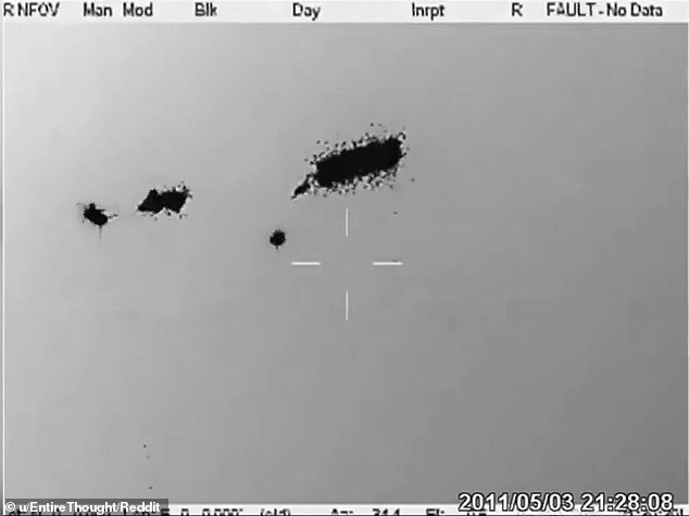 The video showed some sort of artillery or missile striking right through two of the levitating orbs before the debris quickly dissipated into the air and left the mysterious orbs back to their original state