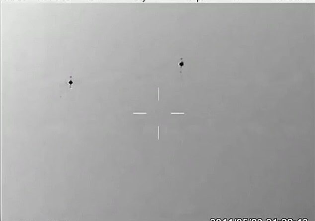 Bombshell 10-minute video shows UFO swarm 'completely unaffected' by missile attack outside military base