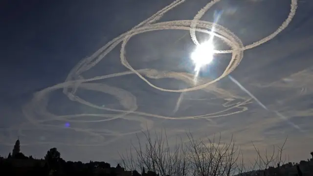 Aircraft vapour trails over Jerusalem in 2021 (file image)