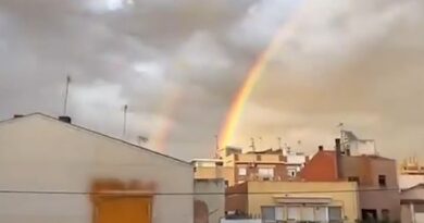 Conspiracy theorists spot 'UFOs' in sky over Spain and claim eerie footage of lights next to double rainbow was 'warning' of flooding disaster