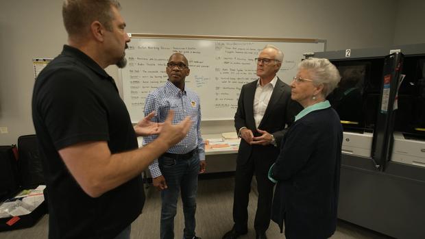 Scott Pelley speaks with trained poll workers in Cobb County, Georgia 