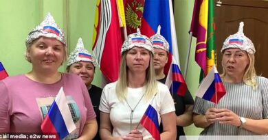 Hilarious moment prankster convinces Russian teachers to wear tinfoil hats dubbed 'Helmets of the Fatherland' to 'protect them from radiation by NATO satellites'