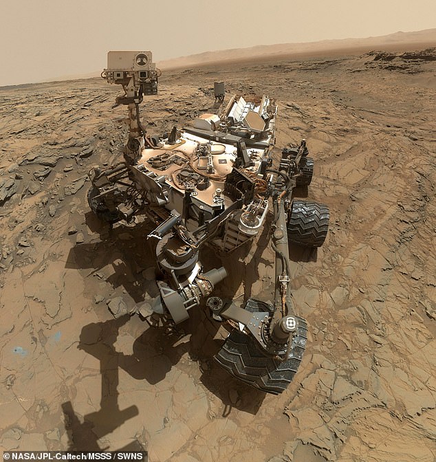 Above, NASA's Curiosity rover takes a 'robotic selfie' on the Red Planet via its arm-mounted Mars Hand Lens Imager (MAHLI). Each of the rover's selfies is really a composite image created from dozens of high-resolution photos taken at various angles by the MAHLI camera