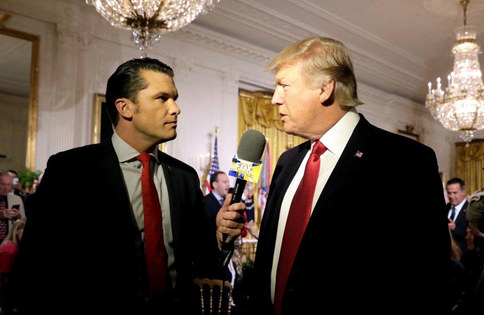 President Donald Trump is interviewed by Fox &amp; Friends co-host Pete Hegseth at the White House in 2017. Trump nominated Hegseth as defense secretary in November.