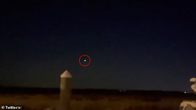 Footage has emerged of what appears to be a ' UFO ' hovering in the skies over New Jersey before suddenly accelerating away leaving the family who were watching lost for words